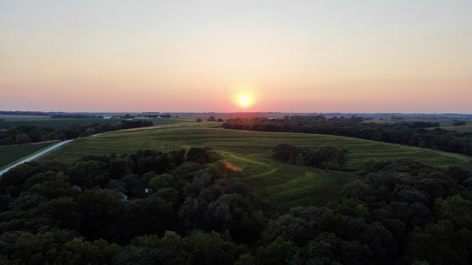 Sunset above rural Nebraska landscape
