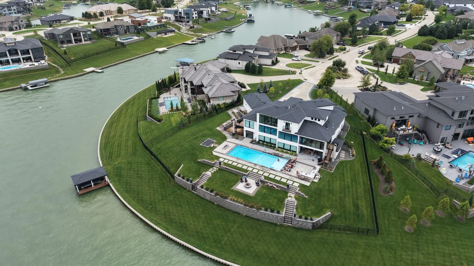 Aerial view of waterfront homes and neighborhood
